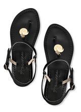 Black Italian suede leather t-strap sandals with astrology zodiac sign coin dangling with Swarovski crystal and horn shaped charms.