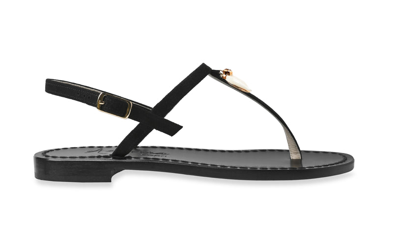 Nero Italian sandals buckles on the side t-strap style with charms hanging from center of the t strap.